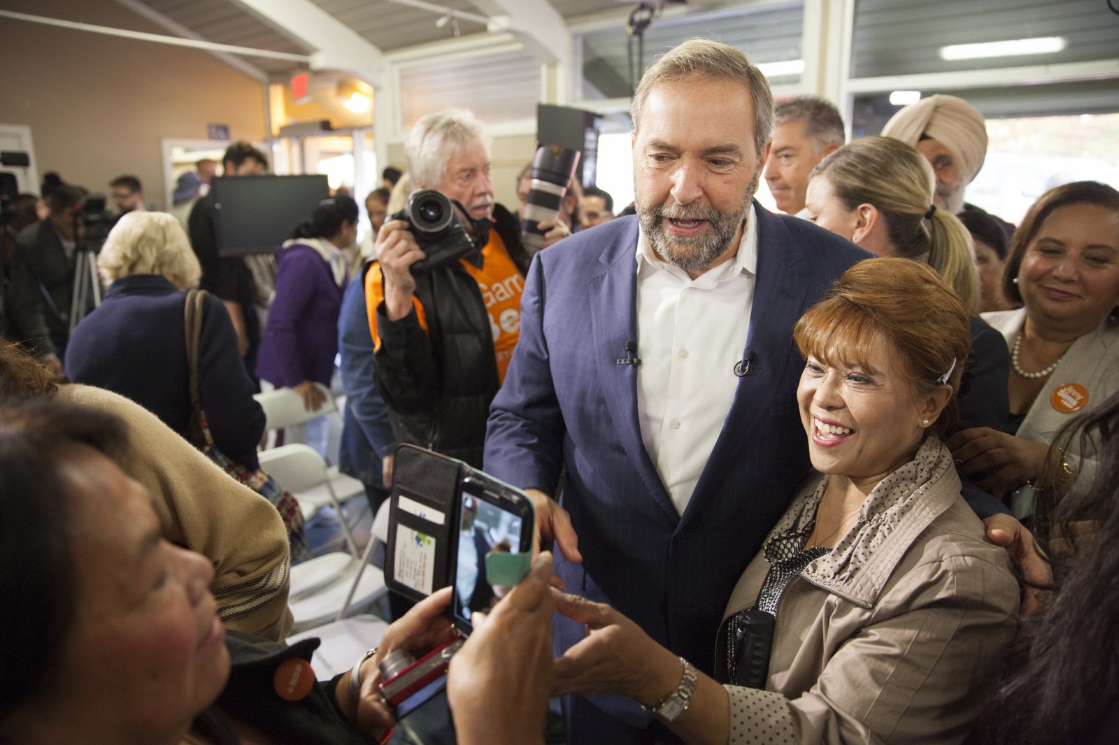 Tom Mulcair and supporter taking photo at NDP rally in Surrey BC - Mychaylo Prystupa