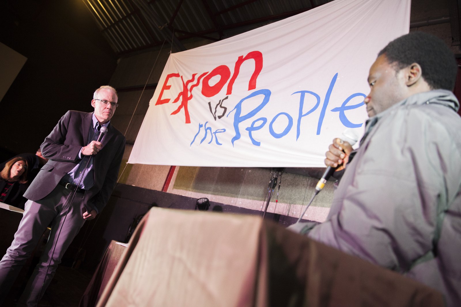 Exxon versus the People Bill McKibben Niger delta activist Ken Henshaw in Paris- Mychaylo Prysupa