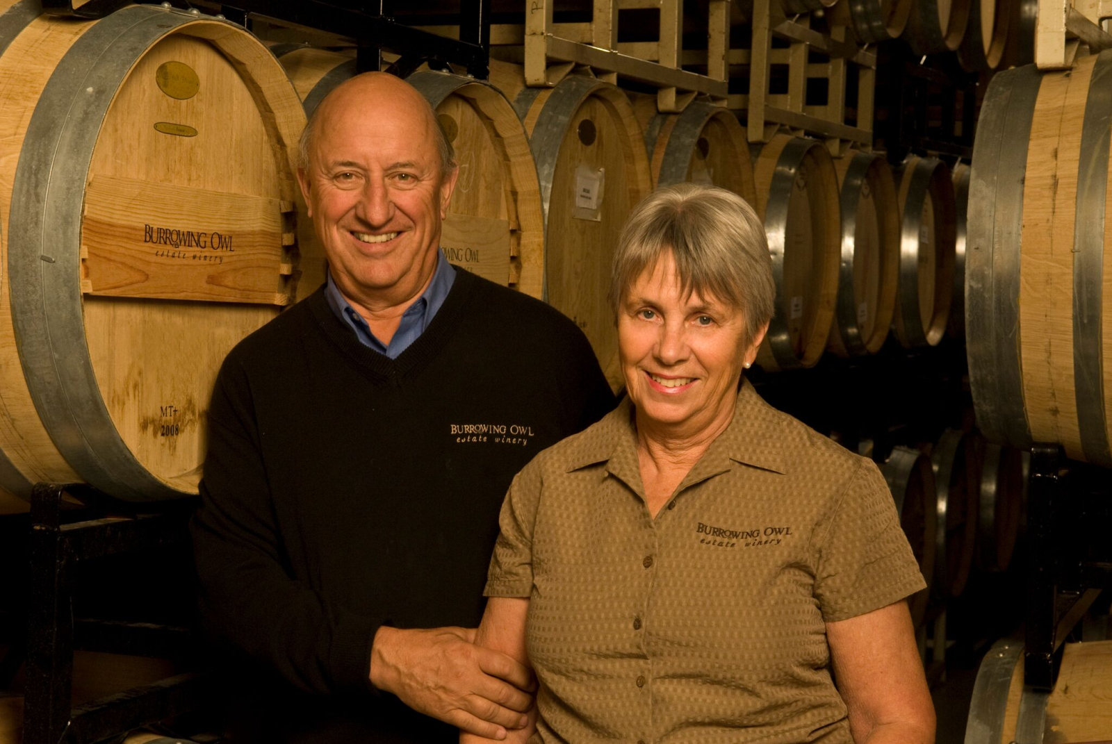 Jim and Midge Wyse in Burrowing Owl's wine cellar. Photo by Burrowing Owl Winery