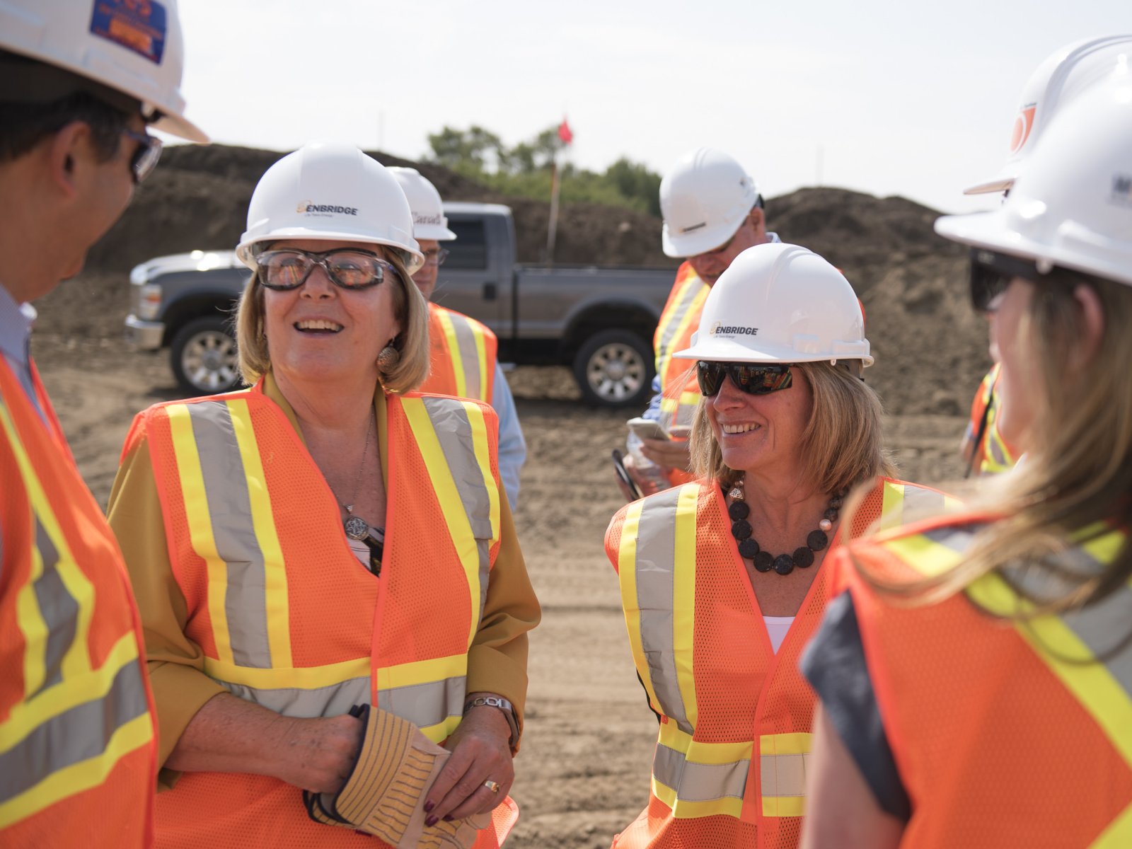 Alberta Energy Minister Margaret McCuaig-Boyd (left) and Premier Rachel Notley tour Enbridge's Line 3 pipeline replacement site at Hardisty, Alta. on Aug. 10, 2017.
