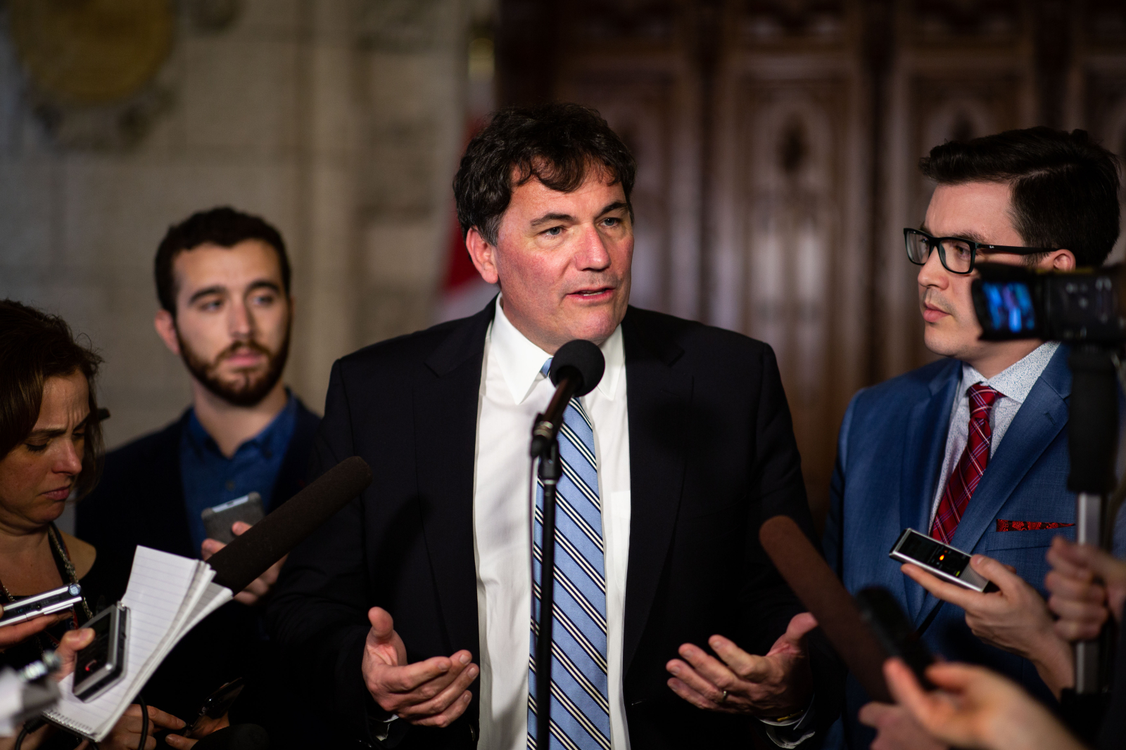 Dominic LeBlanc, the minister of fisheries, oceans and the Canadian Coast Guard, fields reporters' questions about salmon farming in Ottawa on April 24, 2018. Photo by Alex Tétreault