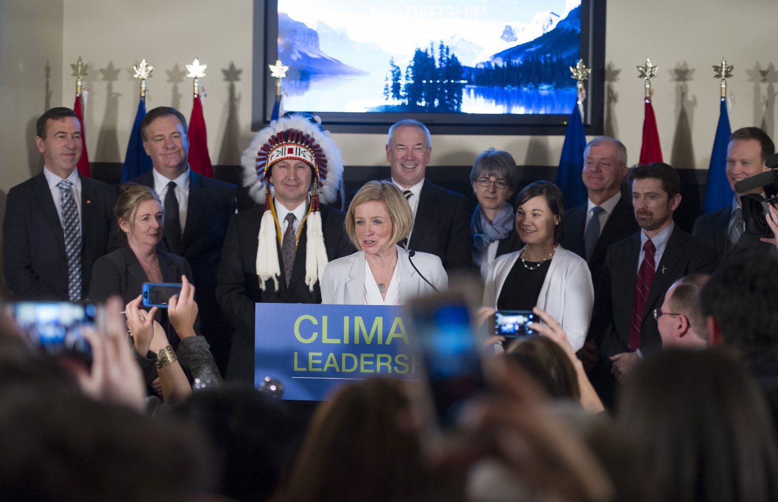 Alberta Premier Rachel Notley was flanked by Environment Minister Shannon Phillips (right) and oilsands industry leaders when she announced the province's climate leadership plan on Nov. 22, 2015 in Edmonton. Photo from the Government of Alberta