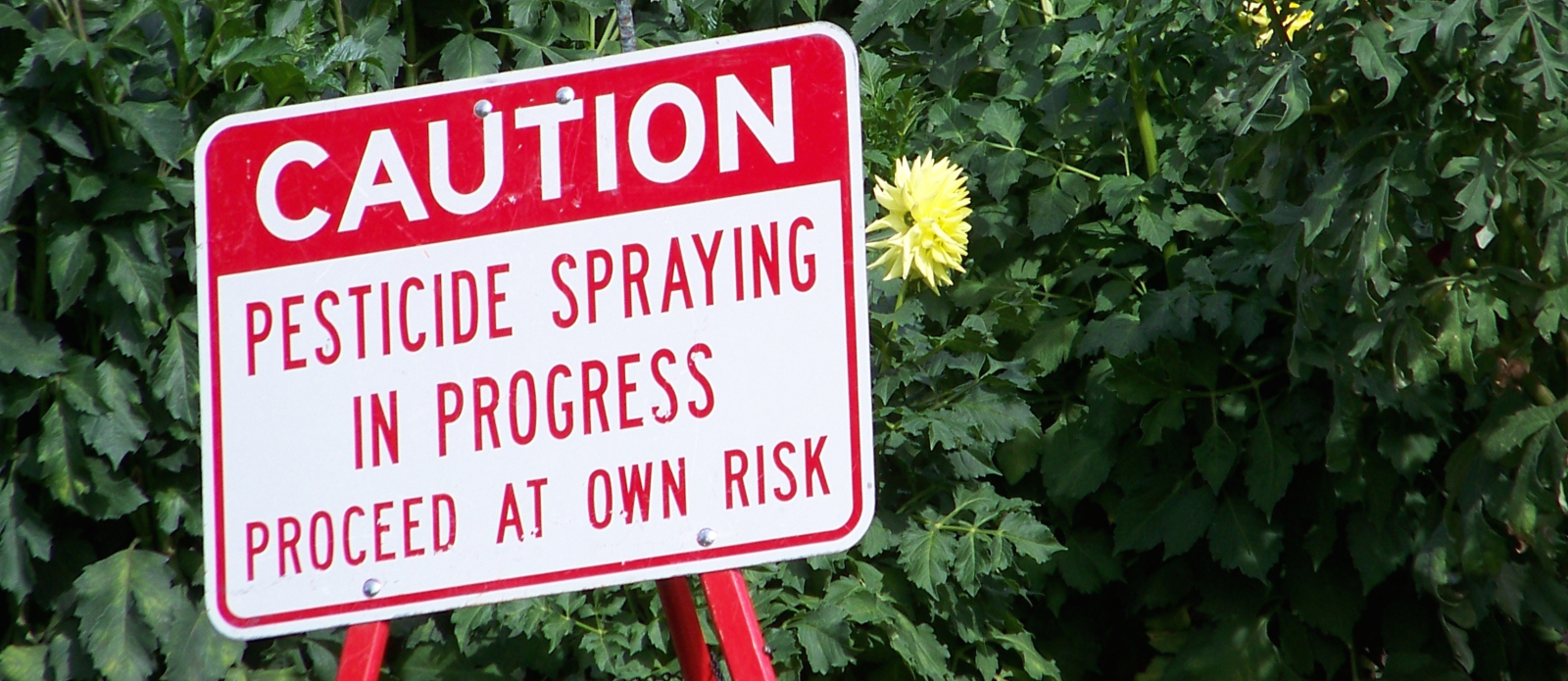 Pesticide warning sign - nutritionfacts.org