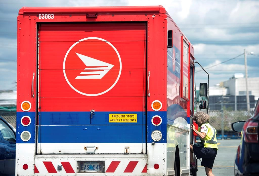Postal worker, Canada Post, truck, labour dispute