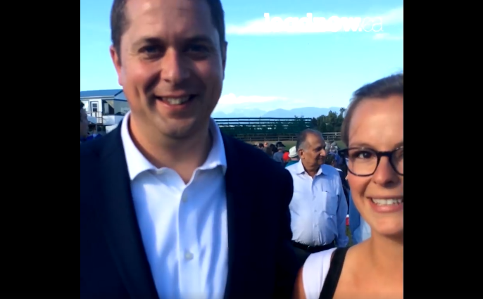Conservative Leader Andrew Scheer speaks briefly to Leadnow Campaigns Director Logan McIntosh in Langley, B.C. on August 16, 2017. Screenshot from Facebook video posted by Leadnow