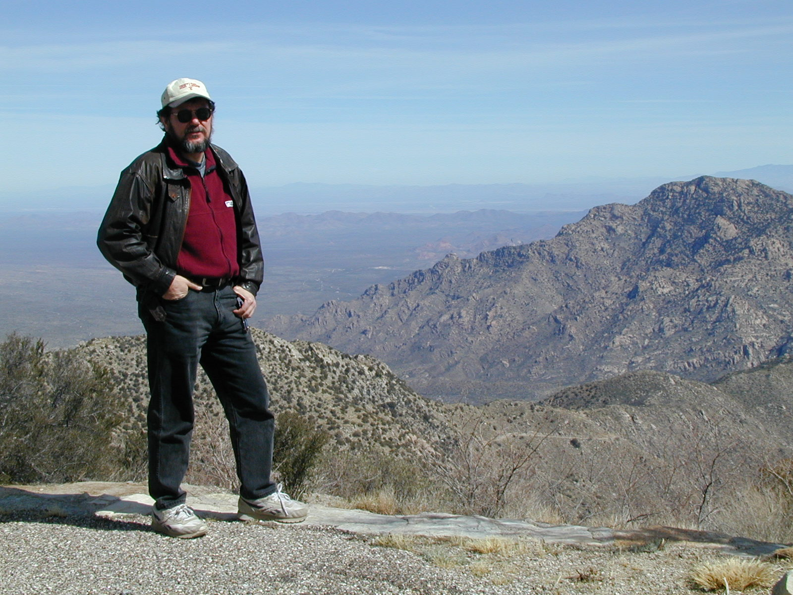 Gregory Csullog standing at Mount Yucca