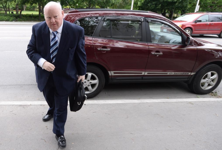 Suspended Senator Mike Duffy outside trial in Ottawa - CP photo