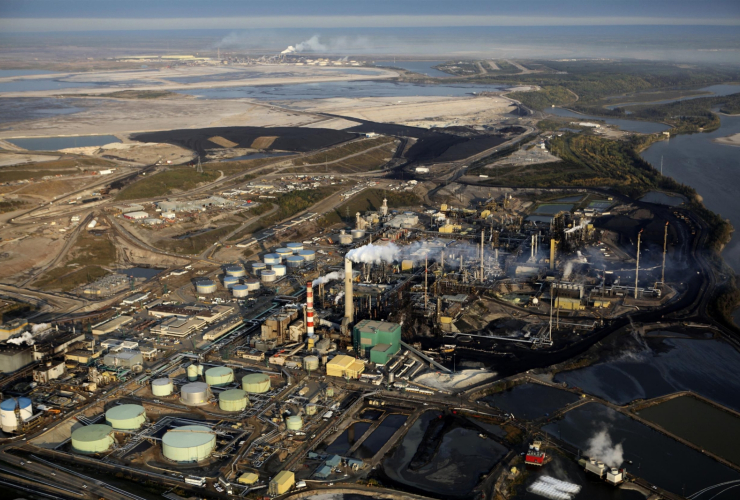 Suncor Refinery outside of Fort McMurray with the Syncrude Refinery visible in the background. Photo by Colin O'Connor, Greenpeace.