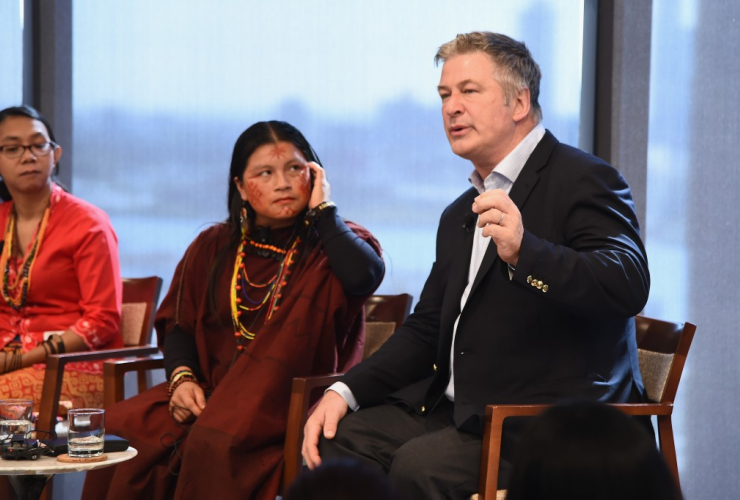 Actor Alec Baldwin speaks while Peruvian environmental activist Diana Rios looks on. Photo from the Ford Foundation