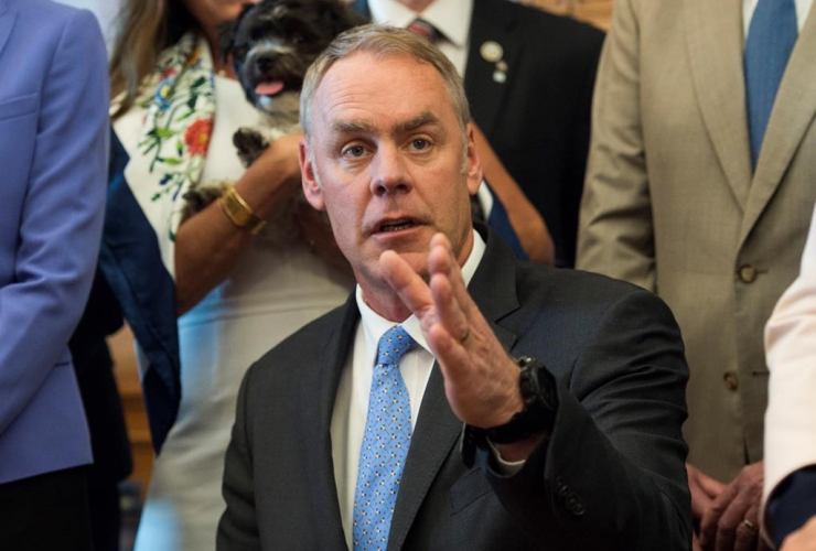 Interior Secretary Ryan Zinke speaks at the Interior Department in Washington, Wednesday, March 29, 2017, after signing an order lifting a moratorium on new coal leases on federal lands and a related order on coal royalties.
