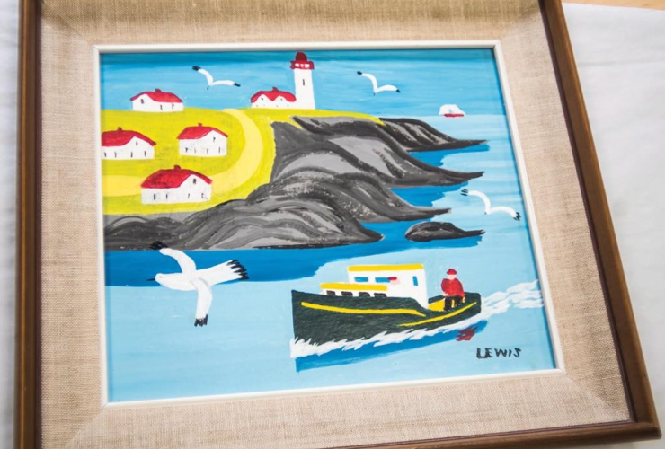 The painting "Portrait of Eddie Barnes and Ed Murphy, Lobster Fishermen, Bay View, N.S.," by Maud Lewis is shown in a handout photo.