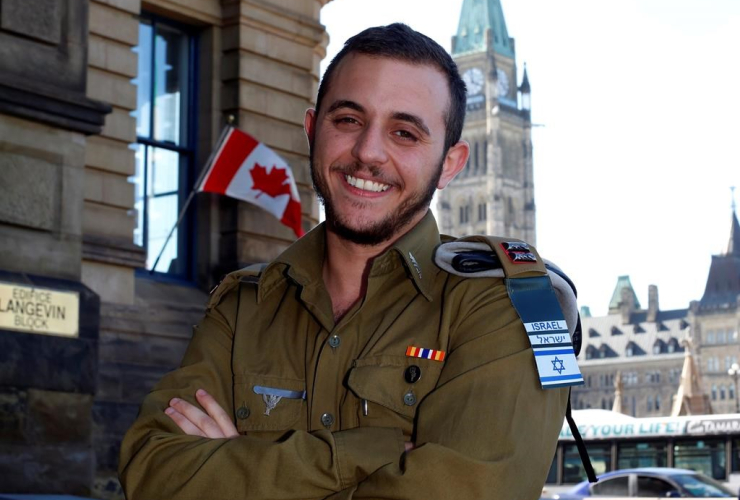 Shachar Erez, the first transgender officer in the Israel Defence Forces, is shown below Parliament Hill in Ottawa, Monday, April 3, 2017.