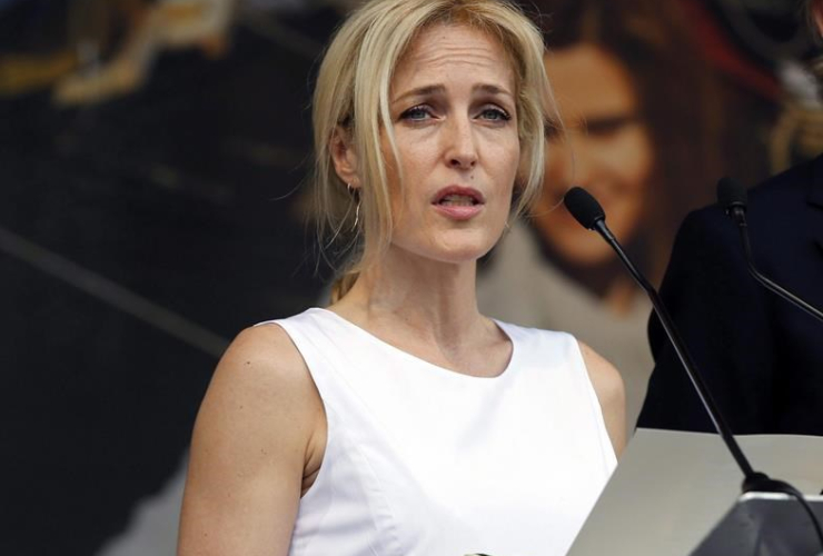 Actor Gillian Anderson speaks at a gathering to celebrate the life of murdered British MP Jo Cox, in Trafalgar Square, London, Wednesday, June 22, 2016.