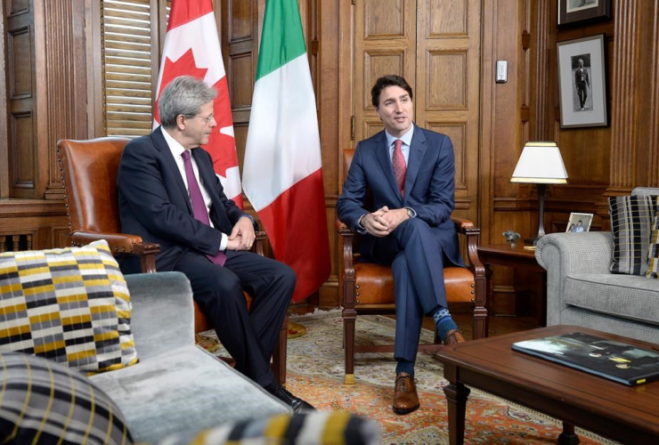 Italy's Prime Minister Paolo Gentiloni, left, meets with Canadian Prime Minister Justin Trudeau in his office on Parliament Hill in Ottawa on Friday, April 21, 2017.