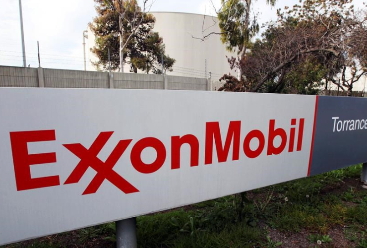 This Jan. 30, 2012, file photo, shows the sign for the Exxon Mobil Torrance Refinery in Torrance, Calif.