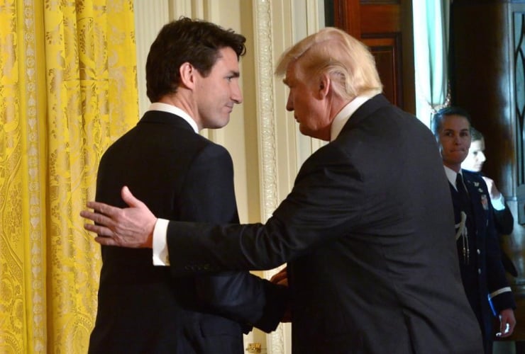 Prime Minister Justin Trudeau and U.S. President Donald Trump shake hands after holding a joint news conference at the White House, in Washington, D.C., on Monday, Feb. 13, 2017.