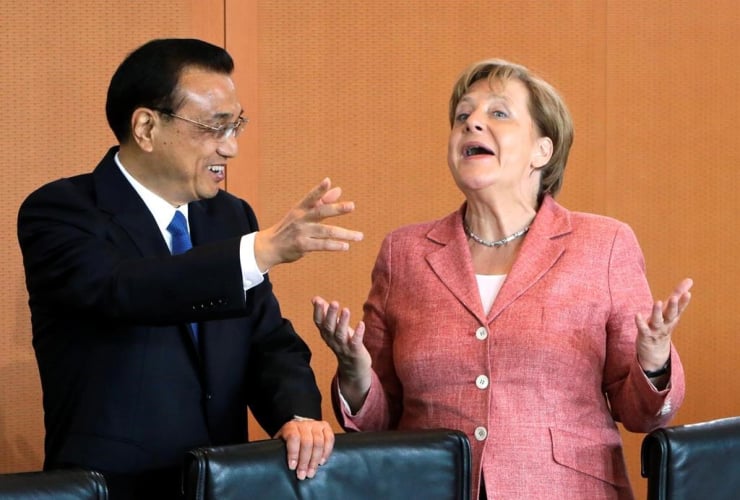 German Chancellor Angela Merkel and China's Premier Li Keqiang joke prior to a meeting at the chancellery in Berlin, Germany, on Wednesday, May 31, 2017. Photo by The Associated Press/Ferdinand Ostrop