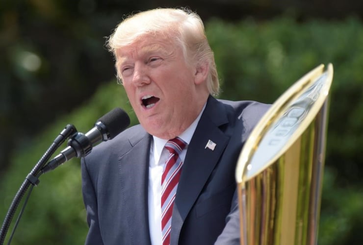 President Donald Trump speaks on the South Lawn of the White House in Washington, on Monday, June 12, 2017, during a ceremony honoring the 2016 NCAA Football National Champions Clemson University Tigers.