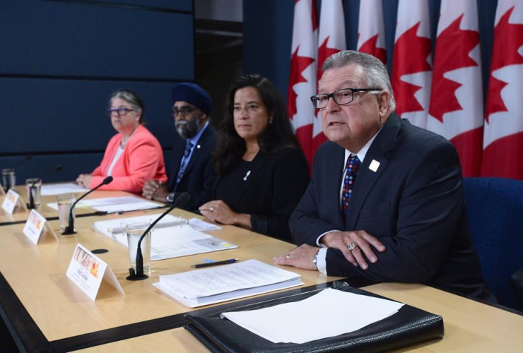Ralph Goodale, Jody Wilson-Raybould, Harjit Sajjan, and Diane Lebouthillier make a national security-related announcement at the National Press Theatre in Ottawa on Tuesday, June 20, 2017