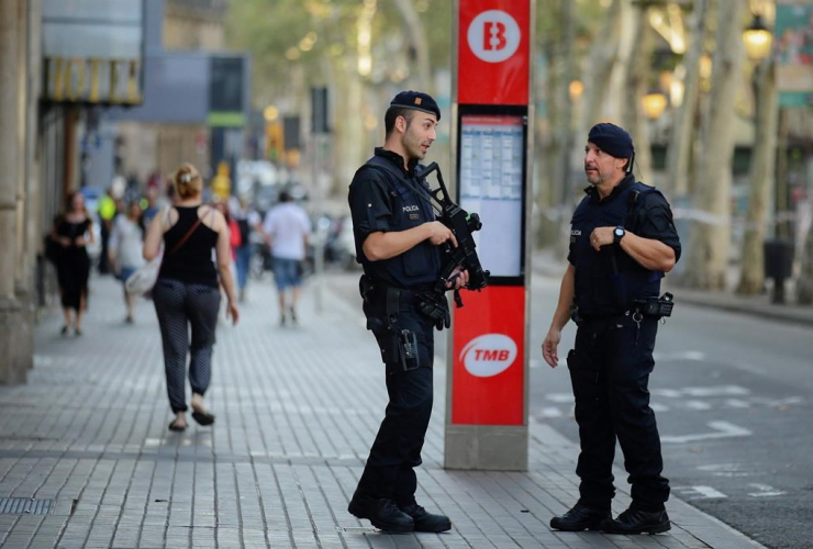 Armed police officers, patrol, Las Ramblas, Barcelona, Spain, 