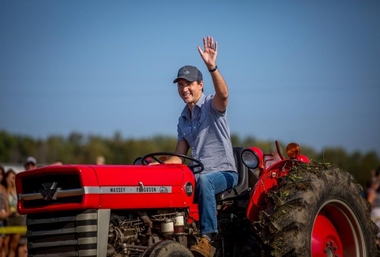 Justin Trudeau, drives, tractor, International Plowing Match, Rural Expo, Walton,