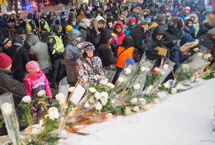 People, flowers, vigil, Centre culturel islamique de Quebec, first anniversary, mosque shooting, 