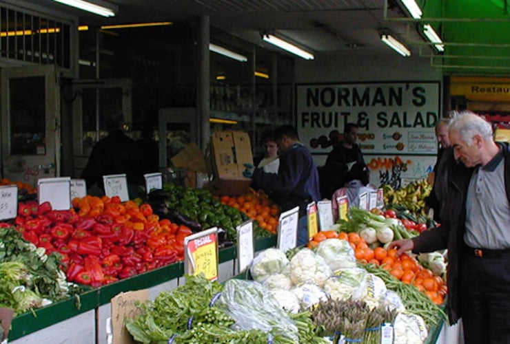 Man shopping for fruit in Vancouver. Photo courtesy City of Vancouver website.