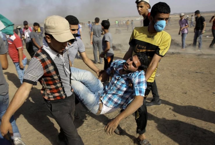 Palestinian, medics, protesters, wounded youth, Gaza Strip, Israel, Khan Younis, 