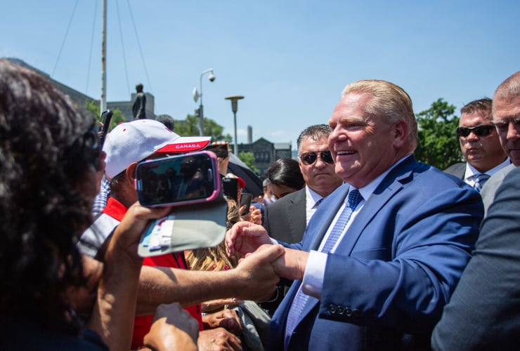 Doug Ford greets people outside Queen's Park in Toronto on June 29, 2018, following his swearing in ceremony. Photo by Alex Tétreault