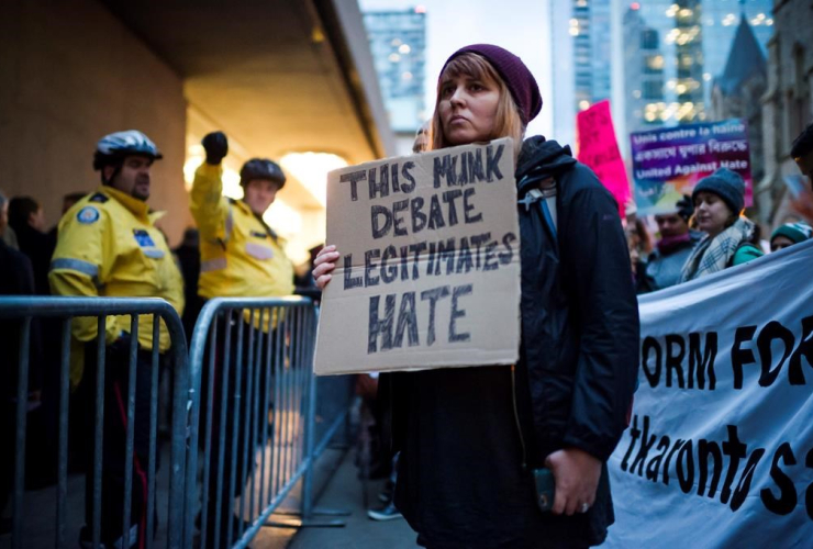 Protesters, Toronto Munk, Steve Bannon, David Frum, 