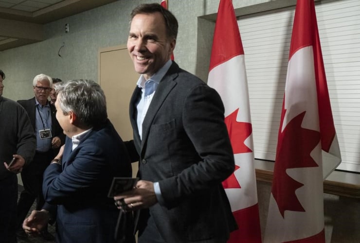 Finance Minister Bill Morneau, Infrastructure and Communities Minister Francois-Philippe Champagne,