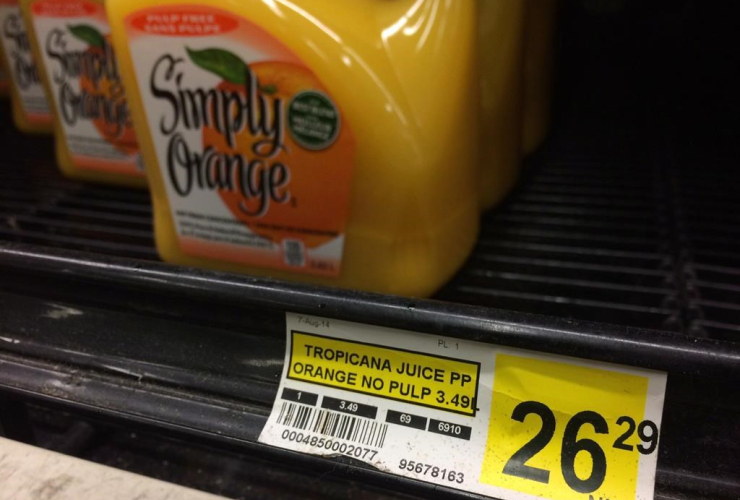 price tag, jug, orange juice, grocery store, Iqaluit, Nunavut,