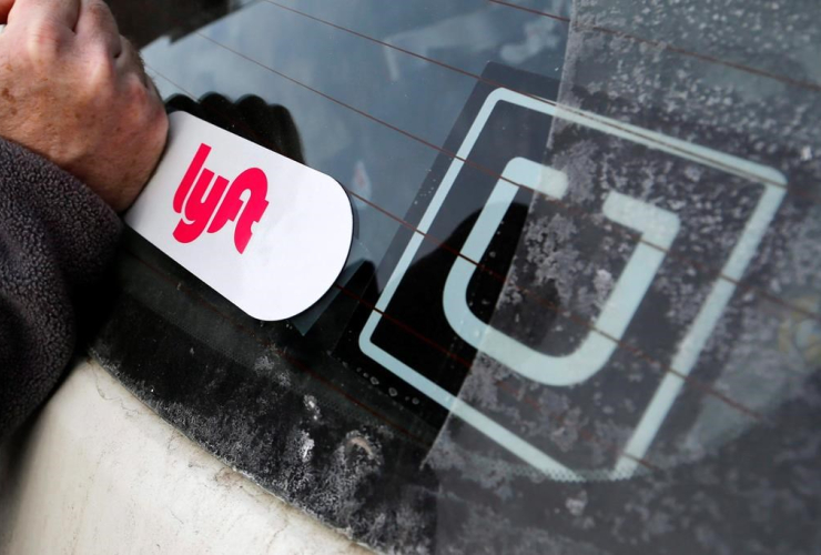 Lyft logo, Lyft driver's car, Uber sticker,