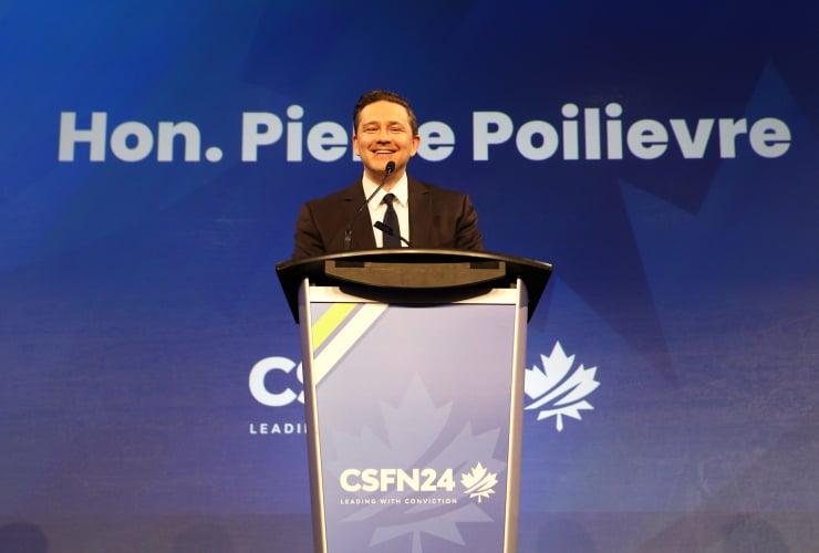 pierre poilievre gives a keynote speech at a conservative conference