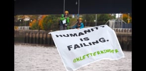Two children protest climate crisis at COP26 by suspending themselves  from Glasgow bridge